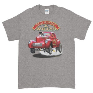 May include: A gray t-shirt with a red 1947 Willys Coupe hot rod illustration. The car is in mid-air with smoke coming from the tires. The text "You Gimme The Willys" is above the car in a yellow banner.