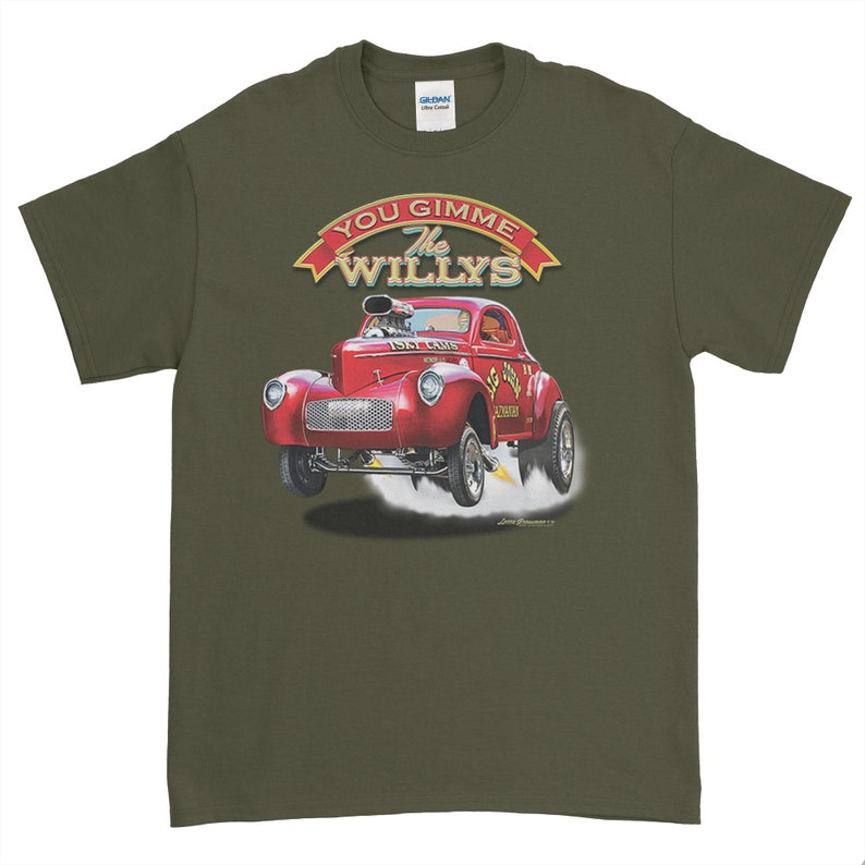 May include: A green t-shirt with a red 1947 Willy's Coupe hot rod illustration. The car is in mid-air with smoke coming from the tires. The text "You Gimme The Willys" is above the car in a red banner.