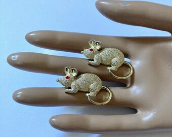 Rare set of mid century gold tone mouse pins.