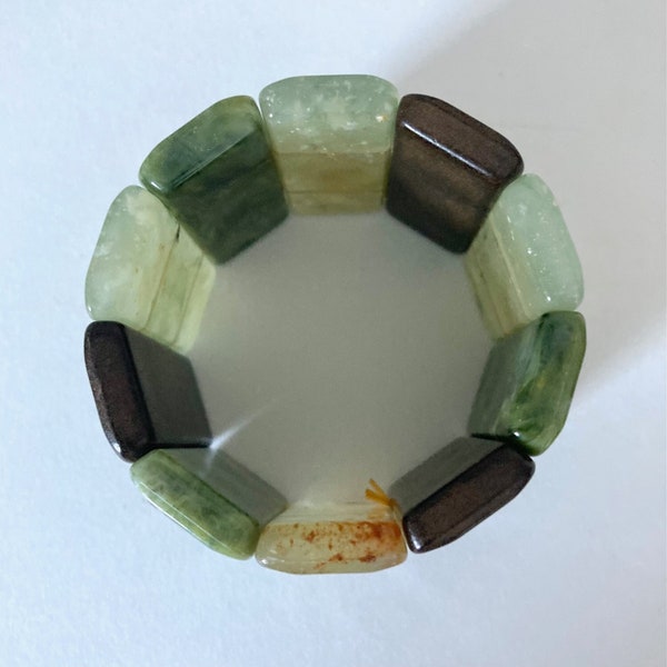 Vintage 1960s boho green faux stone lucite and wood wide stretch bracelet.
