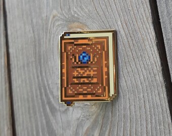 Lärlingens böcker - Pixelinspirerad hård emaljnål