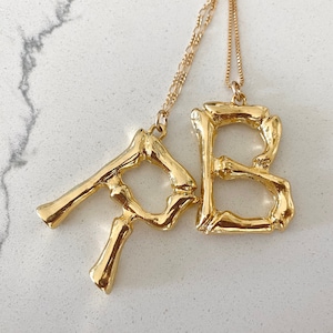 Hunter x hunter bamboo letter necklace outlet