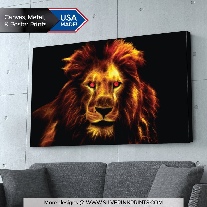 May include: A fiery orange and yellow lion with glowing red eyes against a black background. The lion's mane is made of flames.  USA MADE!  More designs @ WWW.SILVERINKPRINTS.COM
