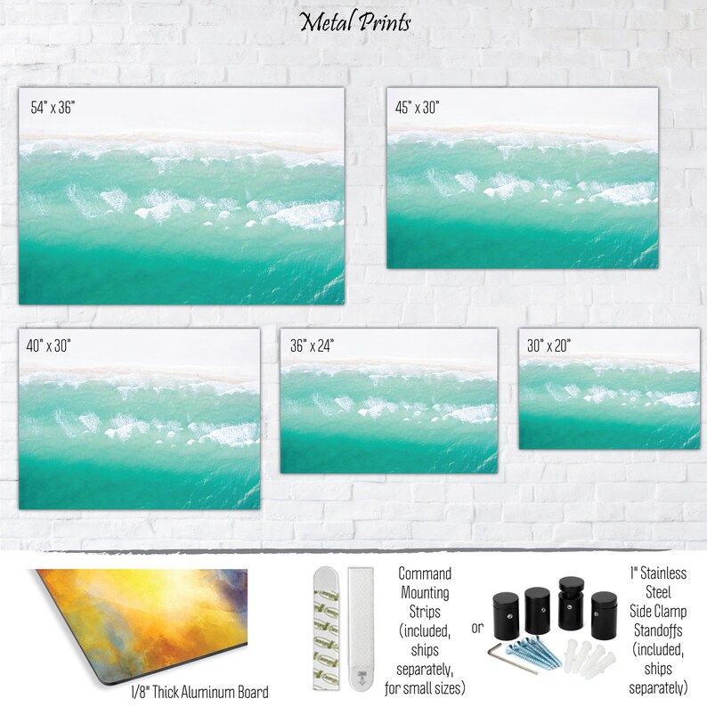 May include: Metal prints of an aerial view of turquoise ocean waves crashing on a white sandy beach. The prints are available in five sizes: 54 inches by 36 inches, 45 inches by 30 inches, 40 inches by 30 inches, 36 inches by 24 inches, and 30 inches by 20 inches. The prints are made on 1/8 inch thick aluminum board and come with either command mounting strips or stainless steel side clamp standoffs.