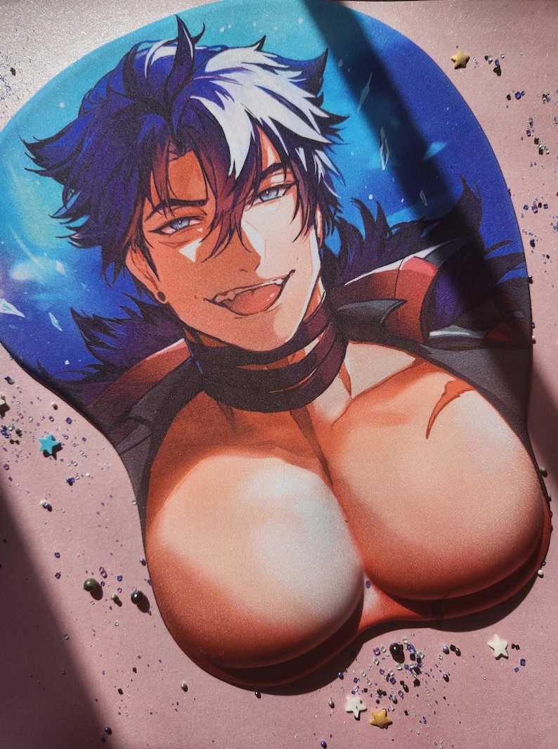 May include: A 3D mouse pad featuring an anime-style character with dark hair, blue eyes, and a smirk. The character has a prominent chest area designed as a wrist rest, with a blue and black background featuring scattered star-shaped accents.