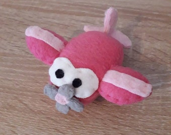 Peluche petit avion rose