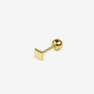 May include: Gold square stud earring with a small ball at the end of the post.