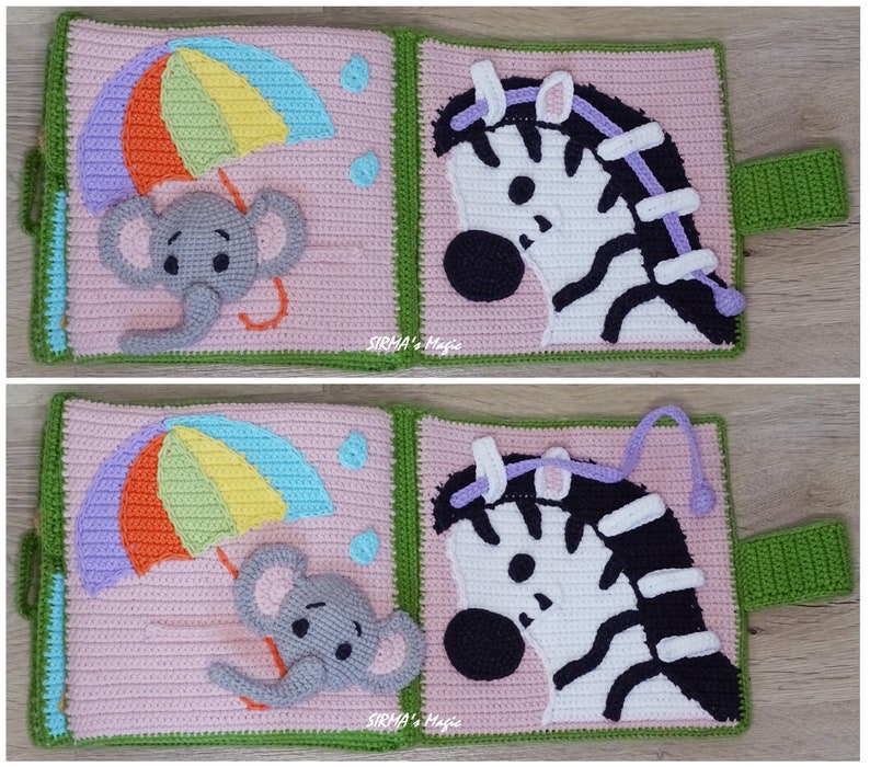 May include: A pink and green fabric book with a rainbow umbrella, a zebra, and an elephant. The book has a purple string attached to the zebra and a grey string attached to the elephant. The book is made of crocheted fabric.