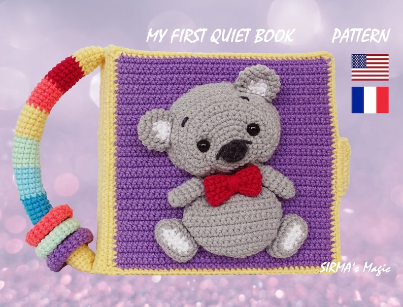 May include: A crocheted quiet book for babies with a purple cover and a gray teddy bear with a red bow tie. The book has a rainbow handle and a yellow border. The text "MY FIRST QUIET BOOK" and "PATTERN" are visible on the cover. The image also includes the American and French flags.