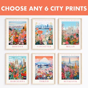May include: Six framed city prints with floral designs. Each print depicts a different city: Boston, Vancouver, Milan, Barcelona, Tokyo, and Reykjavik. The text "CHOOSE ANY 6 CITY PRINTS" is at the top.