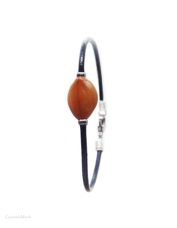 Leather bracelet and Horse Cassia seed (Cassia grandis) harvested in the West Indies