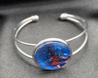 Cosmic Ember Cuff Bracelet — Blue and& Red Abstract Art Jewelry in Silver