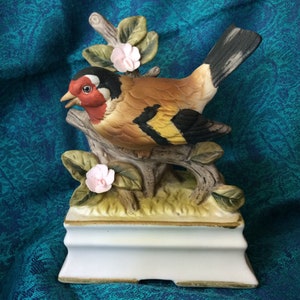 Beautiful Towle Porcelain bisque European Goldfinch bird figurine on branch with pink flowers, pedestal base