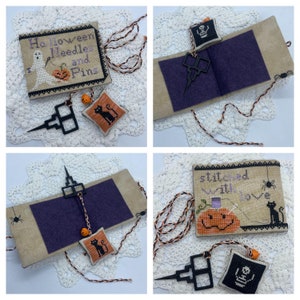 May include: A Halloween-themed needle minder featuring a ghost, pumpkin, and the text "Halloween Needles and Pins". The needle minder is attached to a small black cat pincushion. The needle minder and pincushion are on a white crocheted doily.