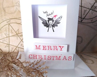 Angel Christmas Card. Insult, simplistic.