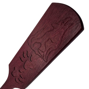 Paddle spankingowy drewniany z drewna amarantowego - piękne łapy do odciskania na skórze. Naturalny kolor drewna.