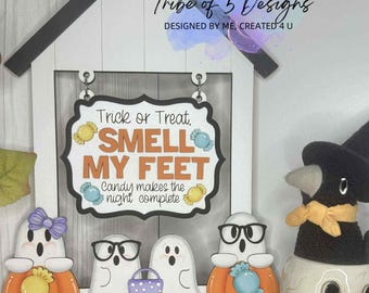 May include: A Halloween-themed wooden sign with a house-shaped frame. The sign reads "Trick or Treat, SMELL MY FEET" with candy graphics. Below are ghost figures on pumpkins. A skull and crow decoration are on the right.