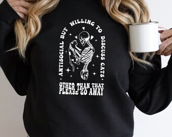 Antisocial but Willing to Discuss Cats Otherwise Go Away IntrovertSarcastic Funny Saying Cat love Skeleton holding Cat Sweatshirt