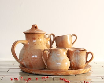 Coffee or tea set in vintage pottery tableware