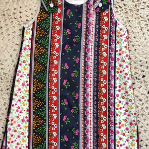 Girls Pinafore dress. Stripy floral design, colourful girls pinafore dress. image 2