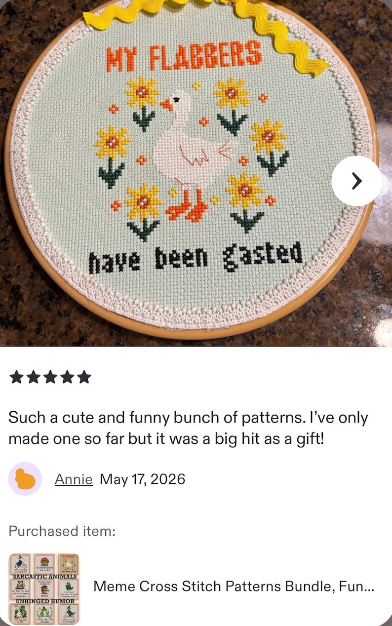 May include: Cross-stitch embroidery hoop with the text "MY FLABBERS have been gasted." The design features a white duck, yellow sunflowers, and green leaves. The hoop is trimmed with lace and yellow ribbon.