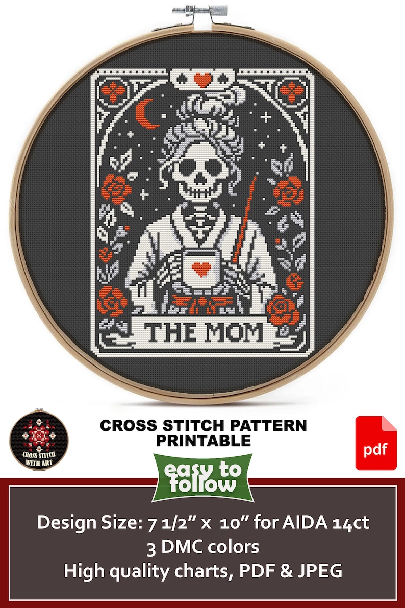 Cross-stitch pattern featuring a skeleton holding a mug with a heart, labeled "THE MOM." The design includes roses, a crescent moon, and stars, framed in a wooden hoop. The pattern is printable.
