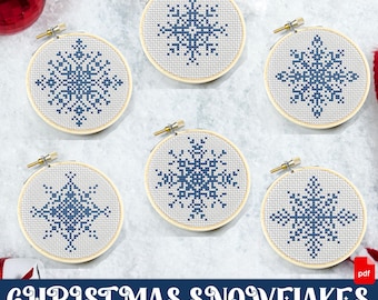 小さな雪の結晶のクロスステッチパターン、冬の幾何学模様の刺繍