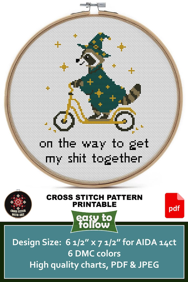 May include: Cross-stitch pattern featuring a raccoon riding a scooter, wearing a wizard hat and robe. The text reads "on the way to get my shit together." The design size is 6 1/2" x 7 1/2" for AIDA 14ct, with 6 DMC colors.