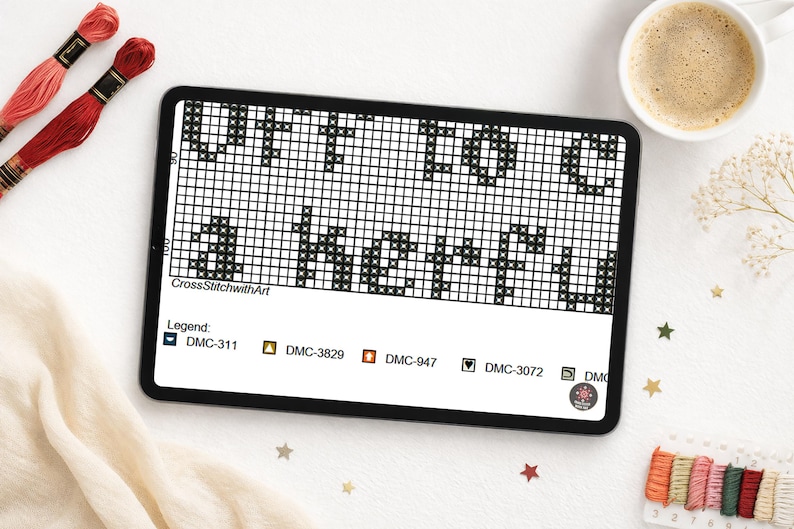 Puede incluir: Un patr&oacute;n de punto de cruz digital en una tableta, con el texto "UT TO BE A HERFU". La imagen incluye hilo de bordar, una taza de caf&eacute; y una leyenda con c&oacute;digos de color DMC.