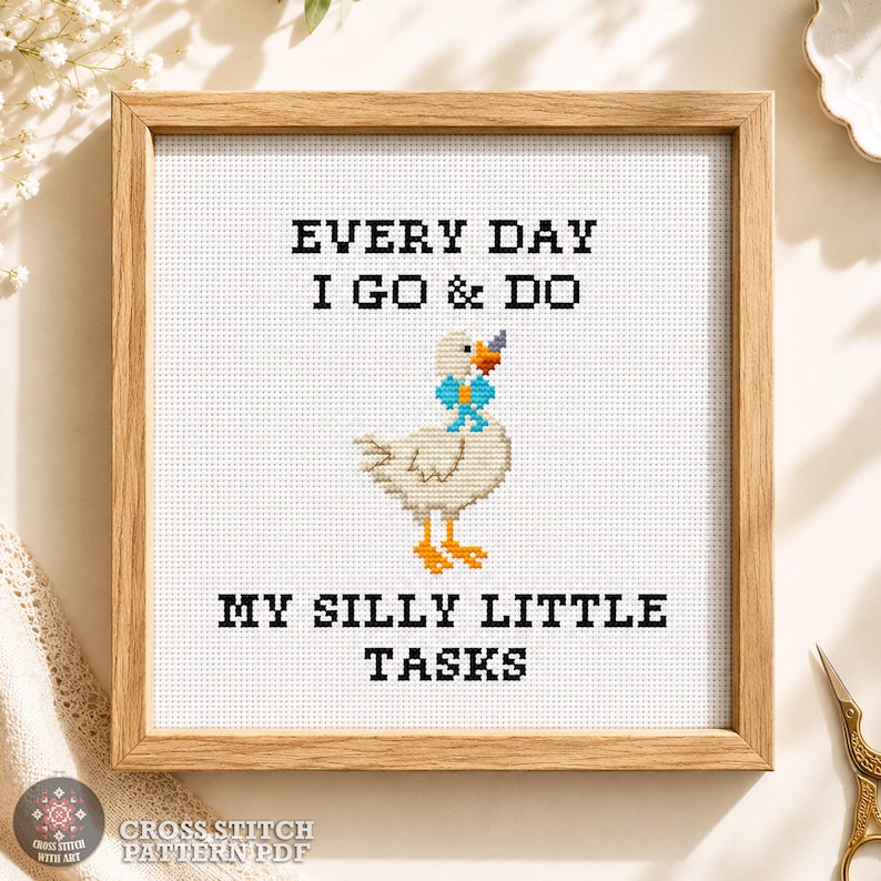 Silly goose, Funny cross stitch pattern PDF shown in a wooden frame with the quote "Every Day I Go & Do My Silly Little Tasks" and complete design information.