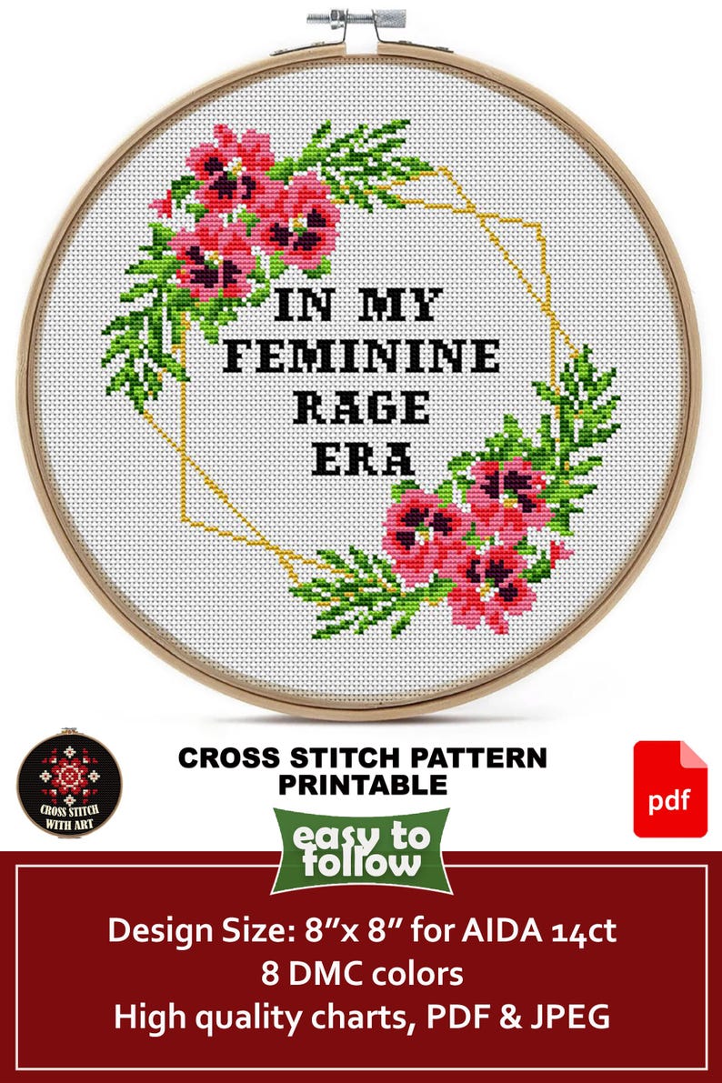 Cross stitch pattern featuring a floral design with the text "In My Feminine Rage Era". The pattern is 8 inches by 8 inches and is designed for 14 count Aida cloth. It uses 8 DMC colors and includes high quality charts in PDF and JPEG formats.