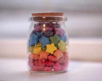 Jar of hand-folded rainbow origami lucky stars