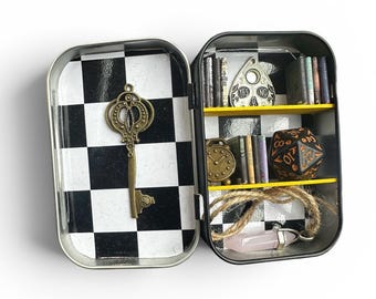Miniature cabinet of curiosities with Ouija board, numerology die, divination pendulum (detachable) and small books