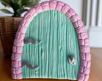 Feeëndeur in watergroen en lichtroze