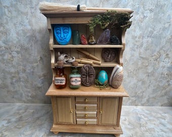 Library of curiosities, with magic vials, real stones, a dinosaur skull, witch's brooms and shamanic masks