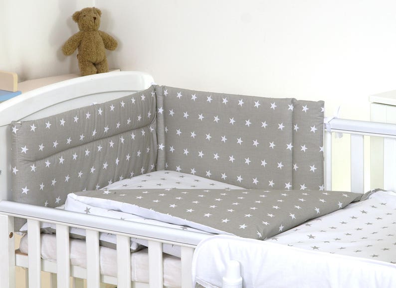 grey and white cot bedding