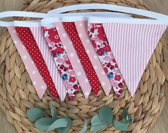 Garland of pennants in red and pink fabrics