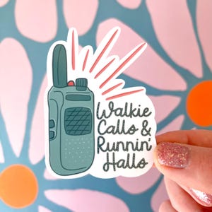 May include: A sticker featuring a teal walkie-talkie design with red sound waves. The sticker has the text "Walkie Calls & Runnin' Halls" in a whimsical font. The background is a floral pattern with pink and blue hues.