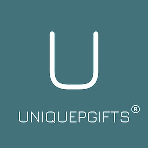 May include: A teal square logo featuring a large white letter U centred at the top. Below the letter, the text UNIQUEPGIFTS is written in a clean white sans-serif font, accompanied by a small registered trademark symbol at the top right corner.