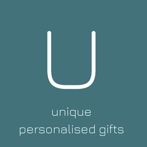 May include: A white letter U on a teal background with the text "unique personalised gifts" below it.