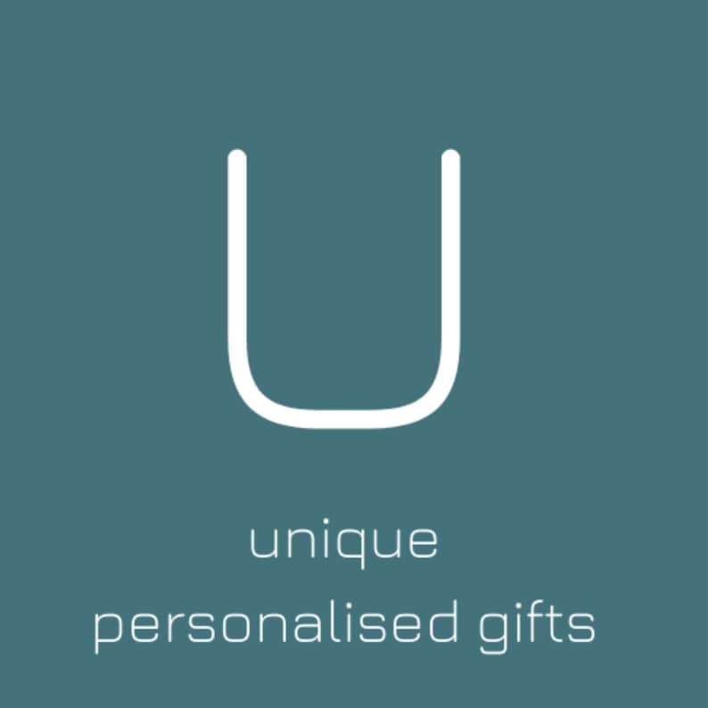 May include: A white letter U on a teal background with the text "unique personalised gifts" below it.