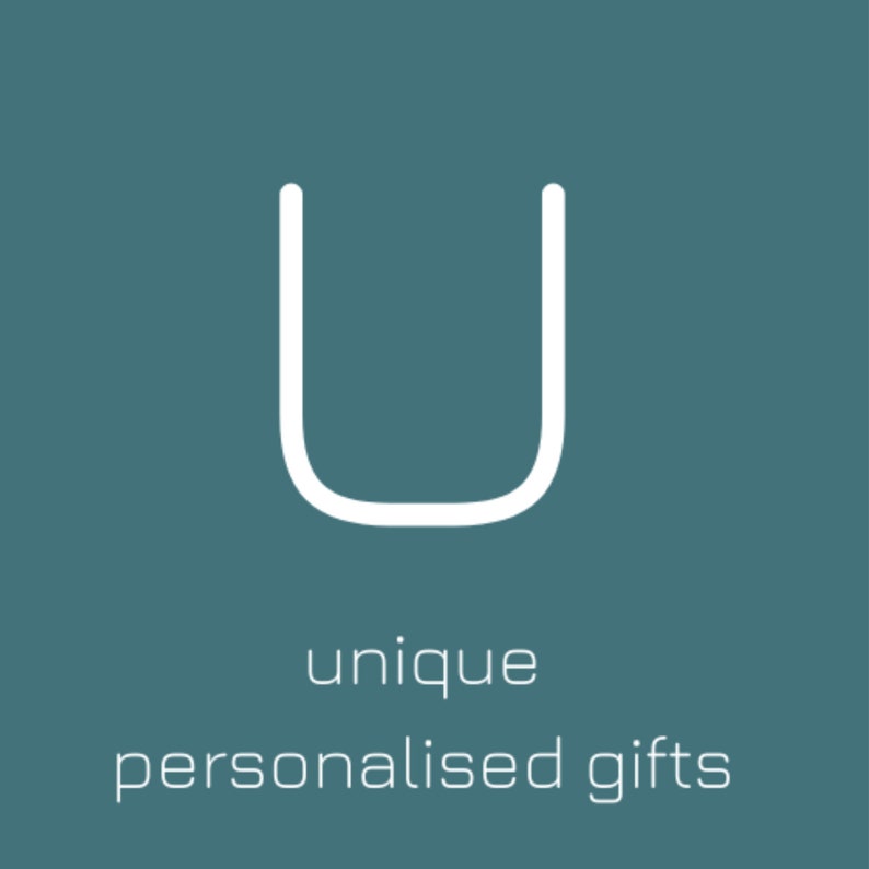 May include: White outlined letter "U" on a teal background. Below the letter, the words "unique personalised gifts" are written in a clean, modern font. The image is simple and focuses on the text.