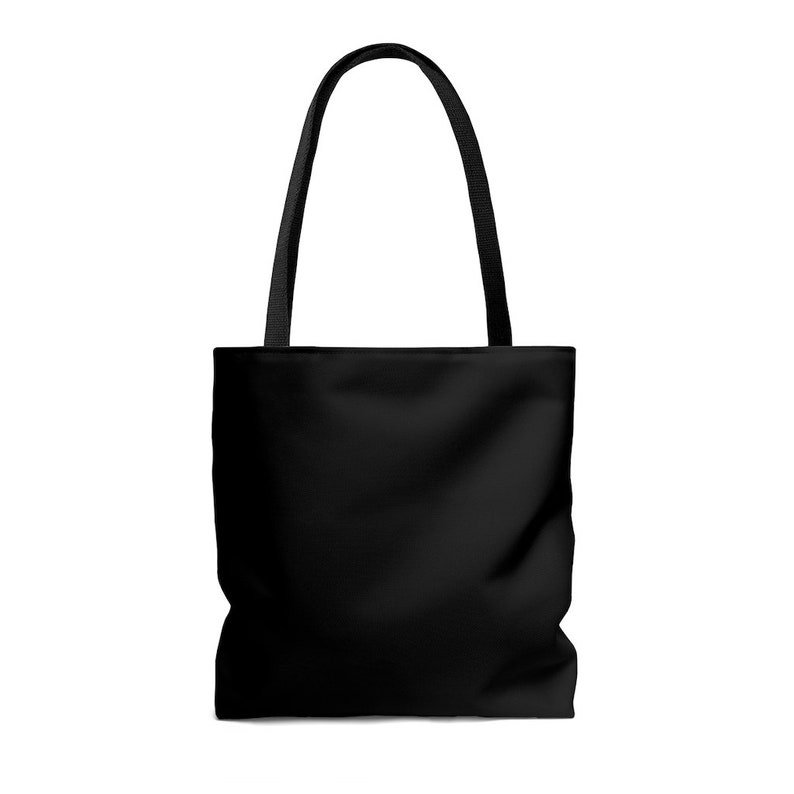 May include: A black tote bag with two long handles. The bag is made of a sturdy fabric and has a spacious interior.