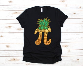 May include: Black t-shirt featuring a pineapple design shaped like the mathematical symbol pi.