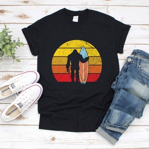 Retro Bigfoot Surfing Sasquatch | T-Shirt | Tank Top | Hoodie |  Hoodie | Long Sleeve |  Apparel Gift