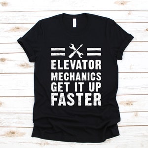 May include: Black t-shirt with a white graphic that says "Elevator Mechanics Get It Up Faster" with a wrench and screwdriver design.