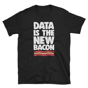 May include: Black t-shirt with white text that reads "DATA IS THE NEW BACON" and a red and yellow stripe graphic.