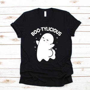 May include: Black t-shirt with a white ghost graphic and the text "BOO-TYLICIOUS".