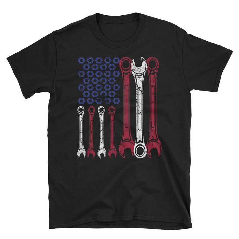 May include: Black t-shirt with a graphic of a wrench-shaped American flag. The flag is made up of wrenches in red, white, and blue.