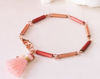 delicate armband gemaakt van koffiecapsules met kwastje roségoud koraal gerecycled armband buizen koper Nespresso